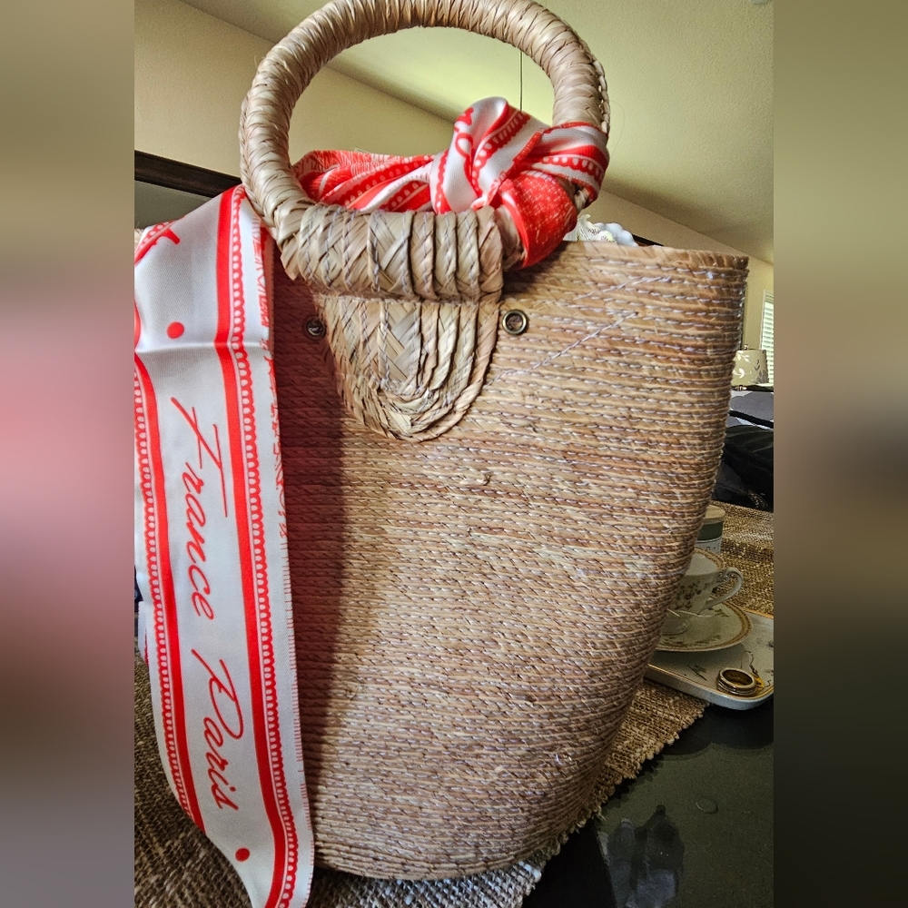 Chic Tan Woven Basket with Red Scarf Accent